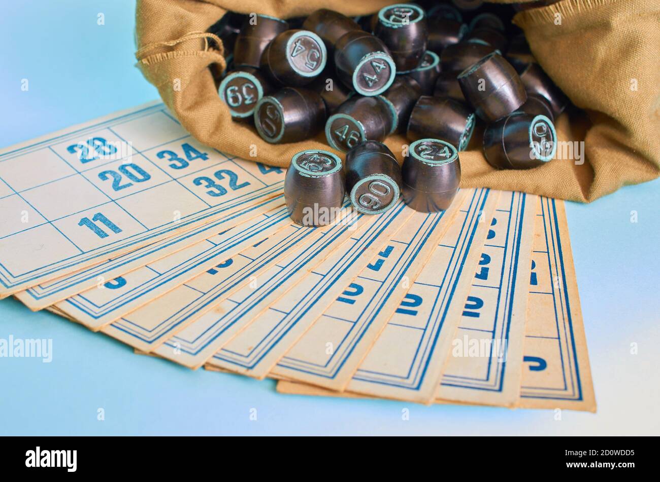 A bag with barrels and cards of the Board game Lotto close up Stock Photo