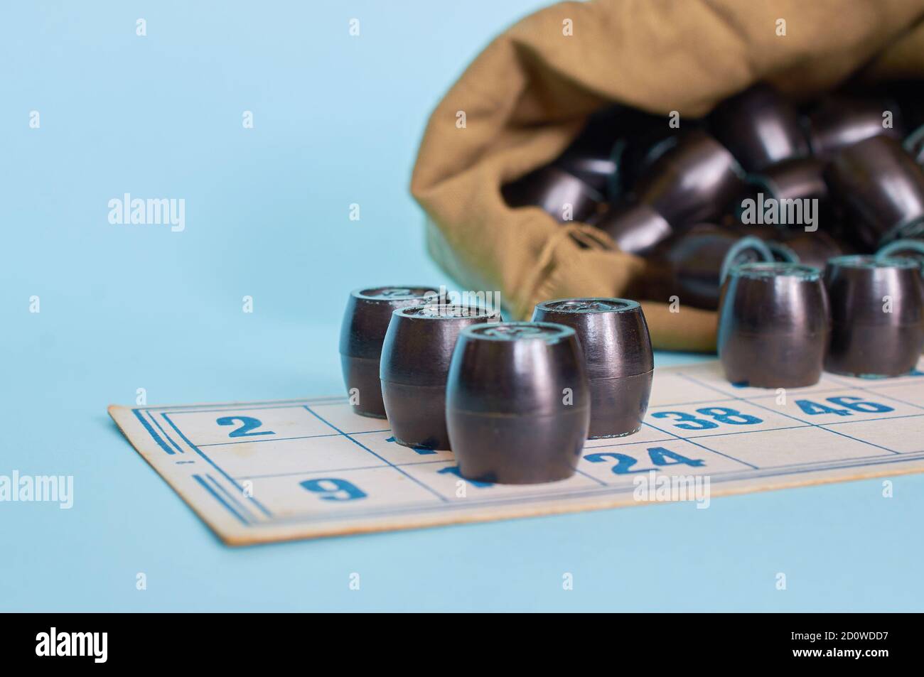 Board game. Lotto. Cards and a bag of barrels. Close up. Stock Photo