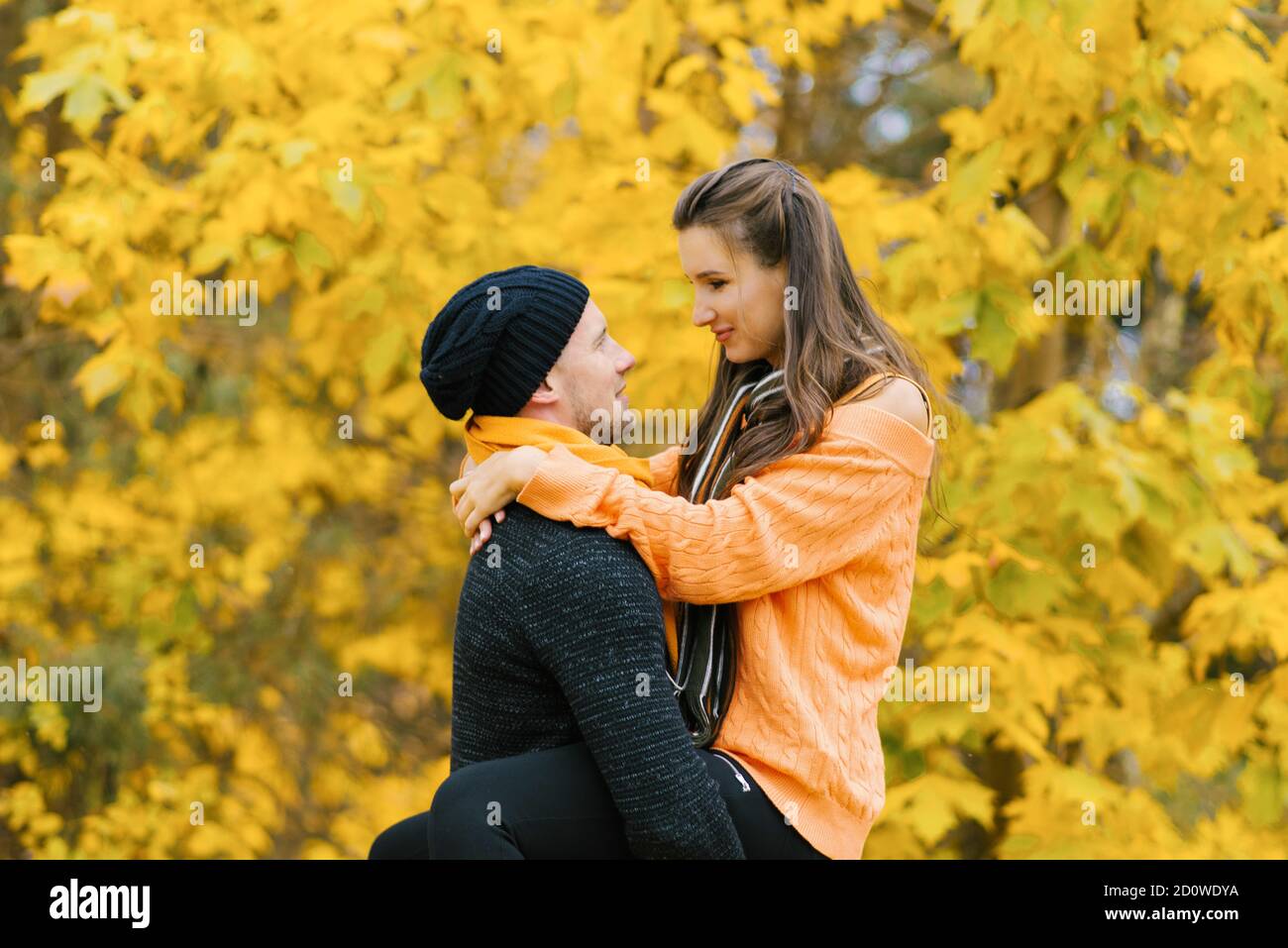 Man holding girl in his arms hi-res stock photography and images - Alamy