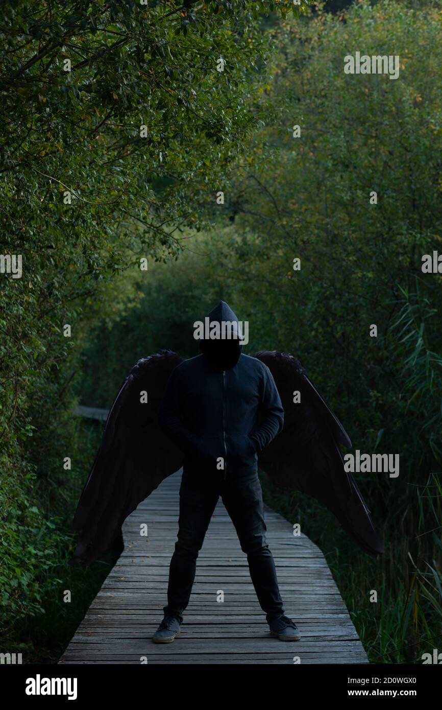 Man with angel wings hi-res stock photography and images - Alamy