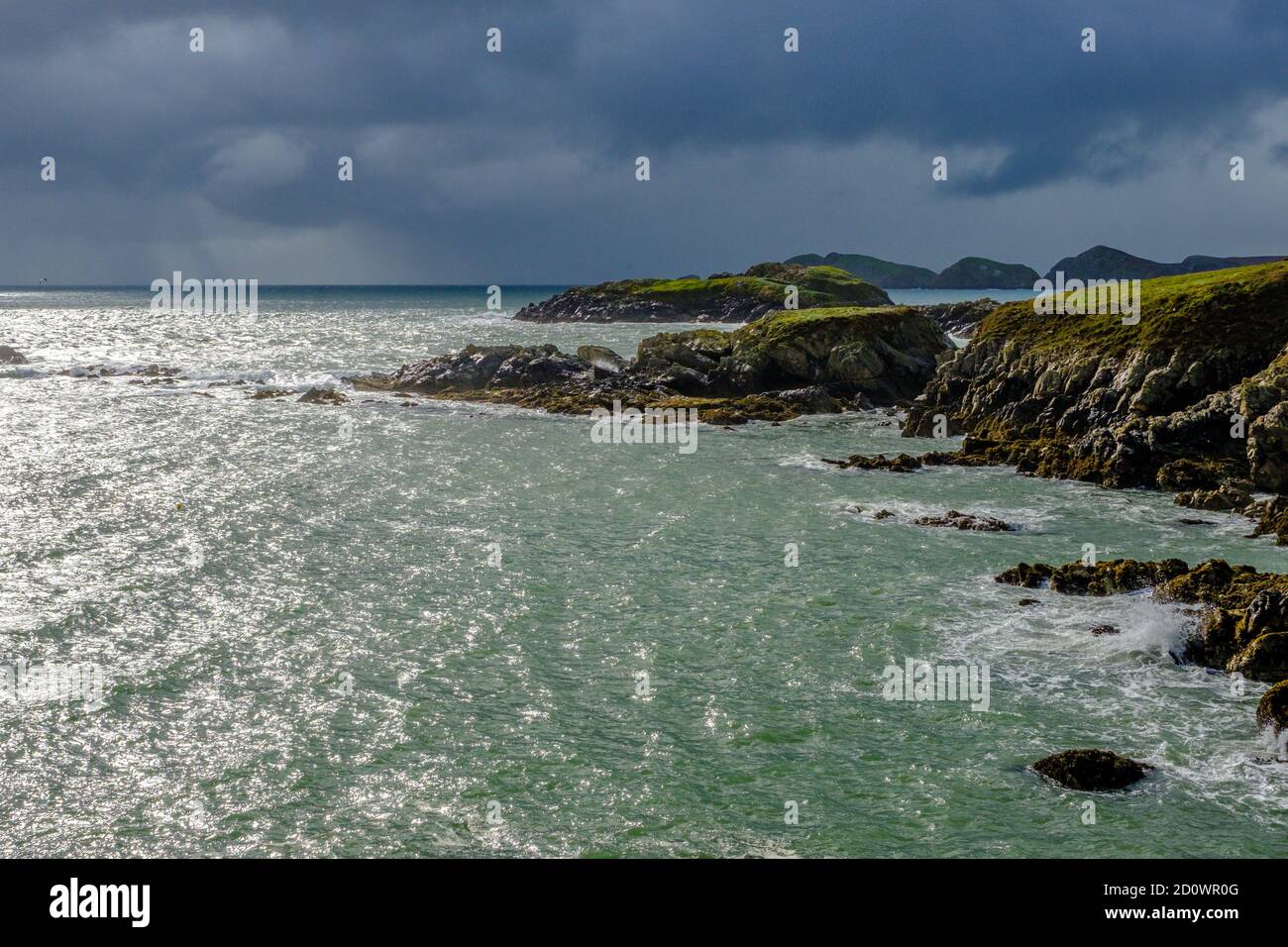 Brooding, stormy sky over the sea and the coastline around St Davids in the Pembrokeshire Coast National Park, Wales,UK Stock Photo