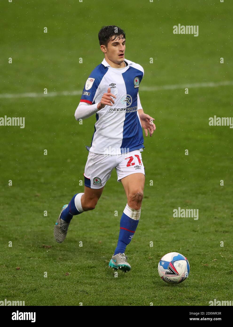 John Buckley #21 of Blackburn Rovers Under pressure fromAndy Rinomhota #35  of Cardiff City during the Sky Bet Championship match Cardiff City vs  Blackburn Rovers at Cardiff City Stadium, Cardiff, United Kingdom