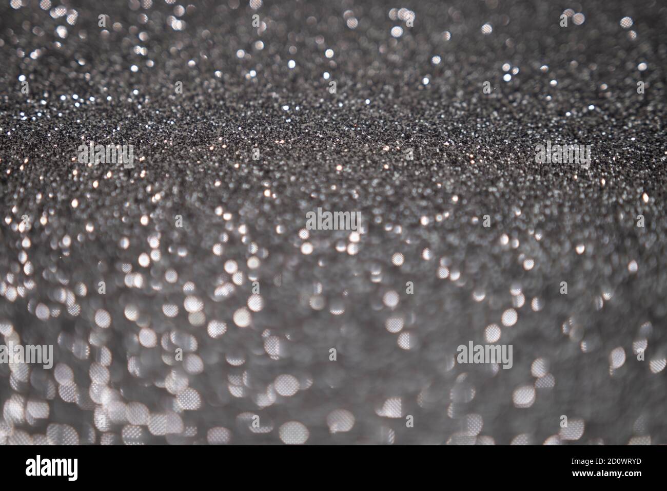 Silver glittering bokeh background New Year concept Stock Photo