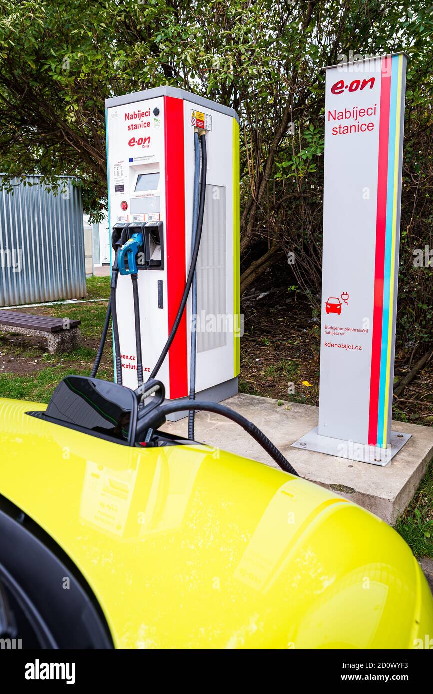 Prague, Czech republic - October 02, 2020. Yellow green electric Honda E -  paid recharging by EON recharge spot Stock Photo - Alamy