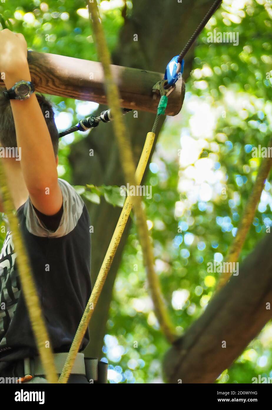 Vertical low angle shot of a male wearing safety equipment ready to