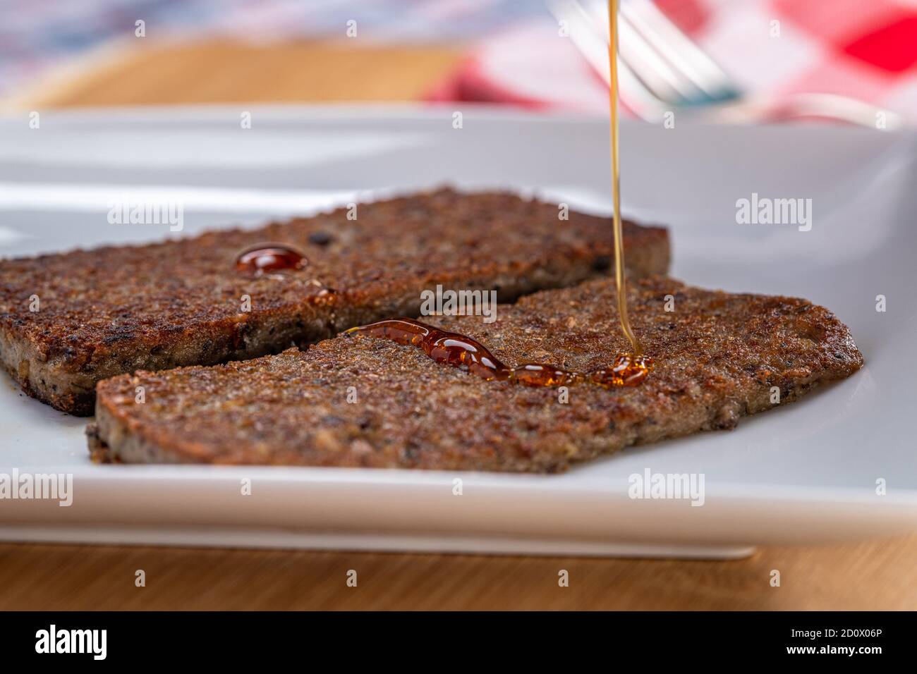 Pouring King's Syrup on Scrapple , Fallston, MD Stock Photo