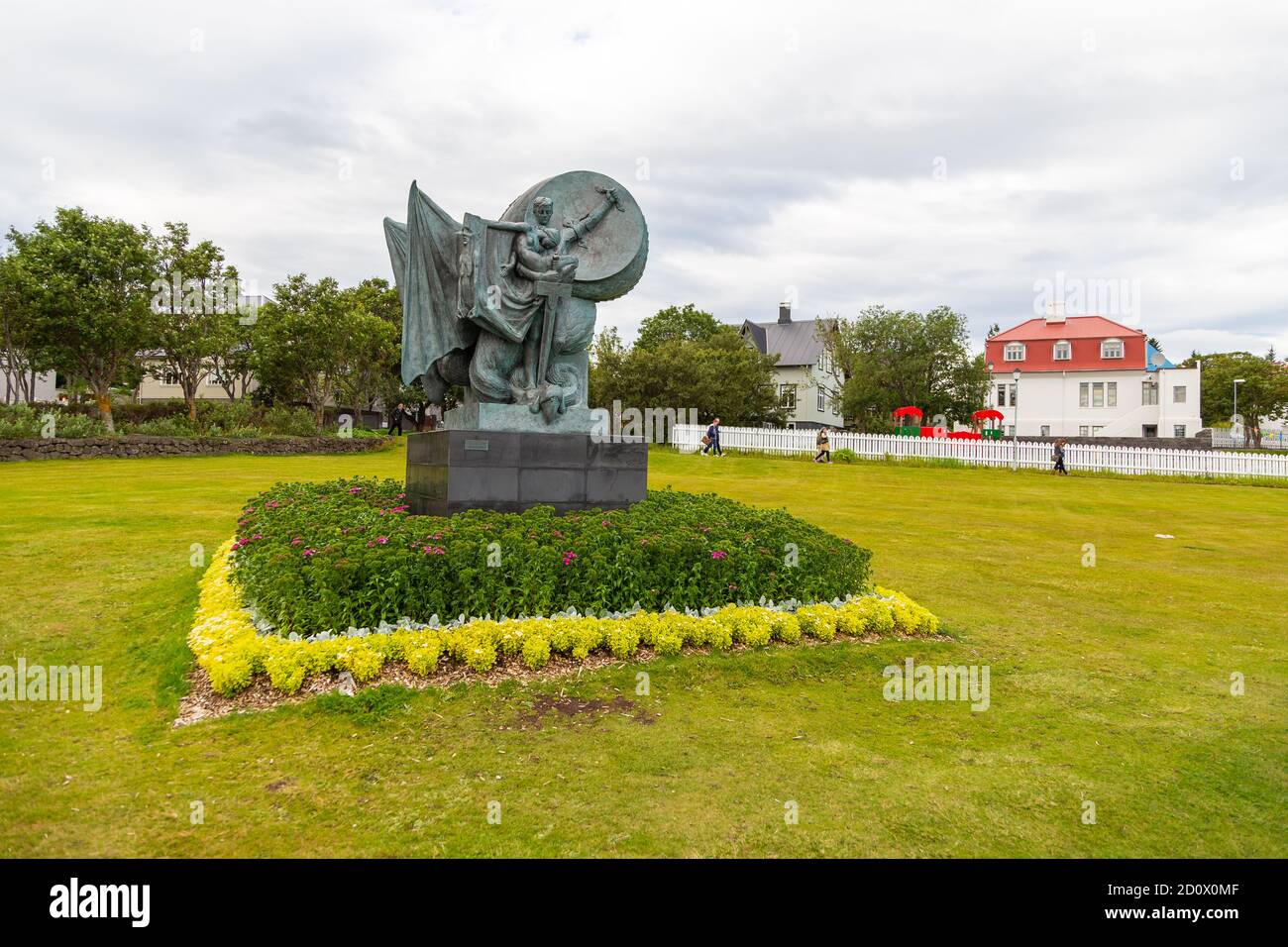 Reykjavik,Iceland- 27 August 2015: Monument at Midborg on Lake Tjornin in the city center. Einar Jonsson statue called - The Spell Broken. Stock Photo