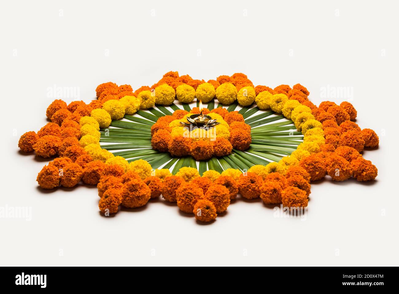 Flower Rangoli for Diwali or Pongal Festival made using Marigold or