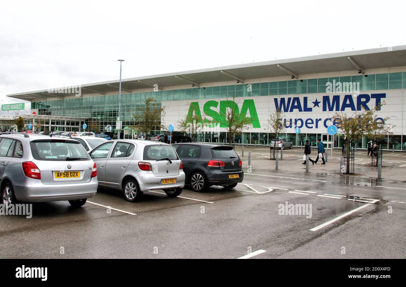 London, UK. 3rd Oct, 2020. Cars are seen parked outside a large Asda and former owner Walmart's super-centres.UK's third biggest supermarket chain Asda has been sold by its US owner Walmart.Billionaire brothers Mohsin & Zuber Issa and private equity firm TDR Capital won the bidding war in a Â£6.8billion deal. The Blackburn based Issa brothers own EG Group, which they built from a single petrol station in 2001 to more than 6,000 sites around the globe and an annual turnover of Â£20billion. It will be the first time Asda has been in British ownership for over 20 years. (Credit Ima Stock Photo