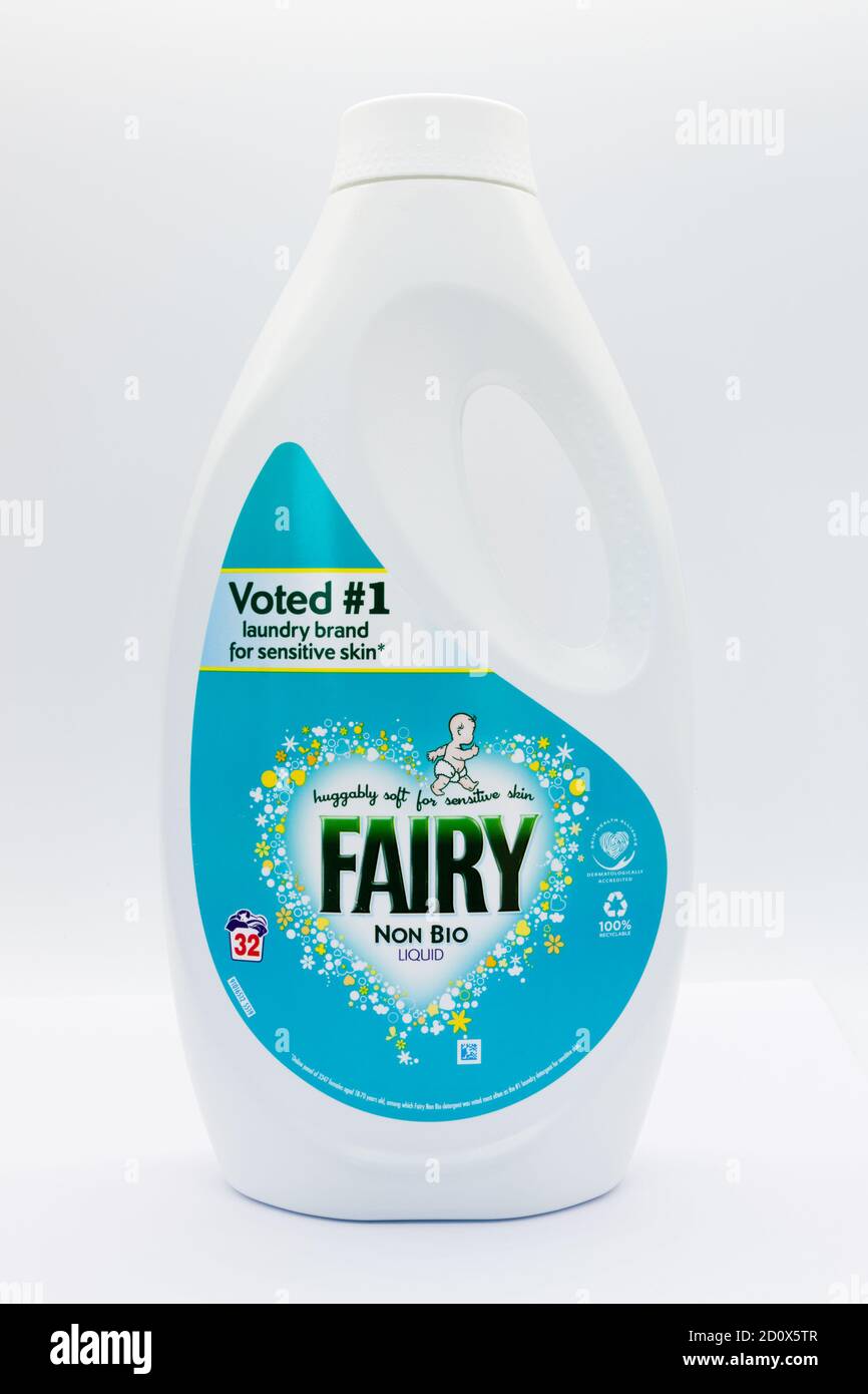 Irvine, Scotland, UK - October 01, 2020: Fairy branded non-bio washing machine liquid in recyclable plastic bottle and top displaying various symbols Stock Photo