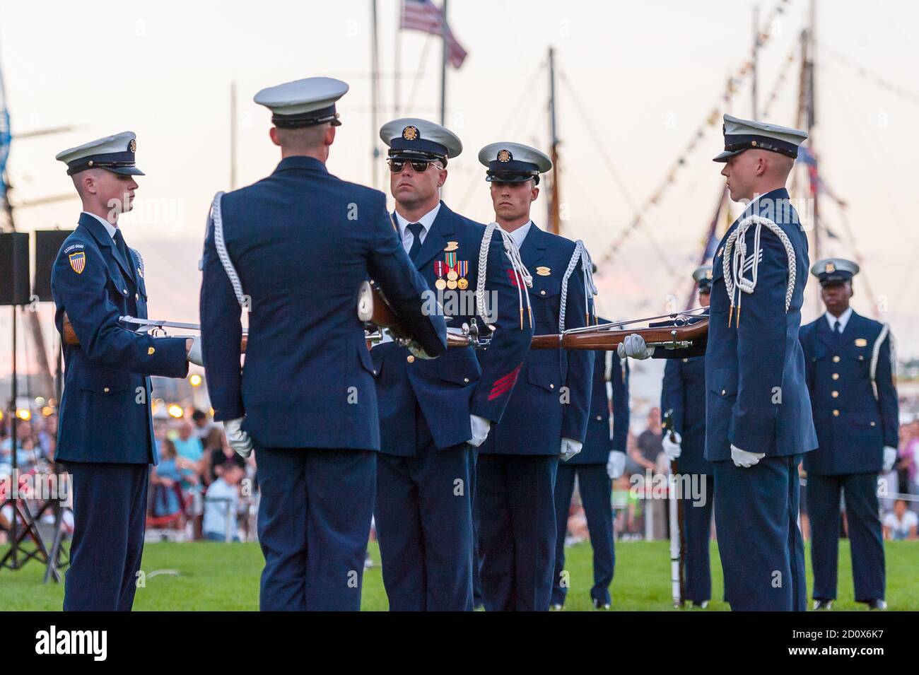Boston, Massachusetts. 21 June, 2017. Sail Boston. US Coast Guard Silent Drill Team performing at the Sunset Salute. Stock Photo