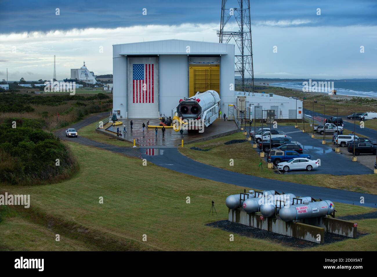 The Northrop Grumman Antares rocket, with Cygnus resupply spacecraft onboard, is rolled out of the Horizontal Integration Facility on its way to the Mid-Atlantic Regional Spaceport Launch Pad-0A at the NASA Wallops Flight Facility September 26, 2020 in Wallops, Virginia. The commercial cargo resupply mission is carrying 8,000 pounds of supplies and equipment to the International Space Station. Stock Photo