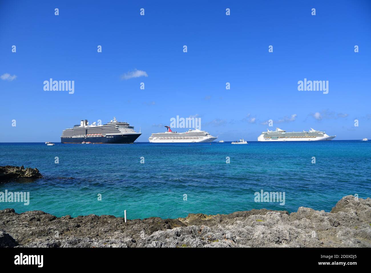 Cruise ships Holland American Line Zuiderdam, Carnival Victory and Royal Caribbean Independence of the Seas in George Town, Cayman Islands. Stock Photo