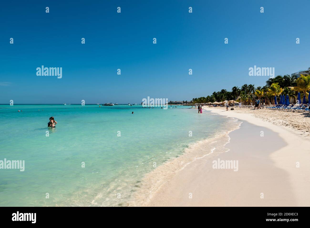 Isla Mujeres (Cancùn), Mexico: tropical  seascape of Playa Norte (North Beach) during a holiday period. Stock Photo