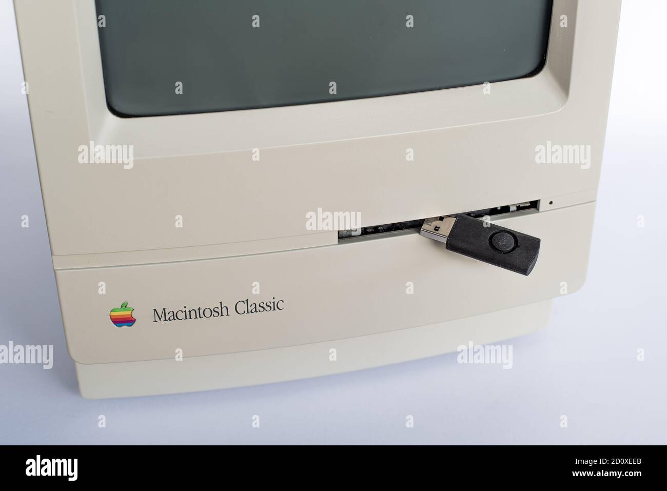 USB stick does not fit into an floppy disc drive on a Macintosh Classic, Denmark, september 28, 2020 Stock Photo
