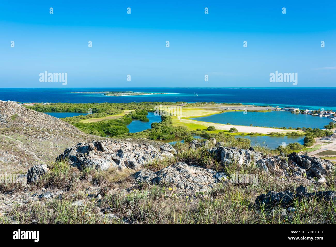 Top view of the village in Gran Roques island with the touristic airport (Los Roques Archipelago, Venezuela). Stock Photo