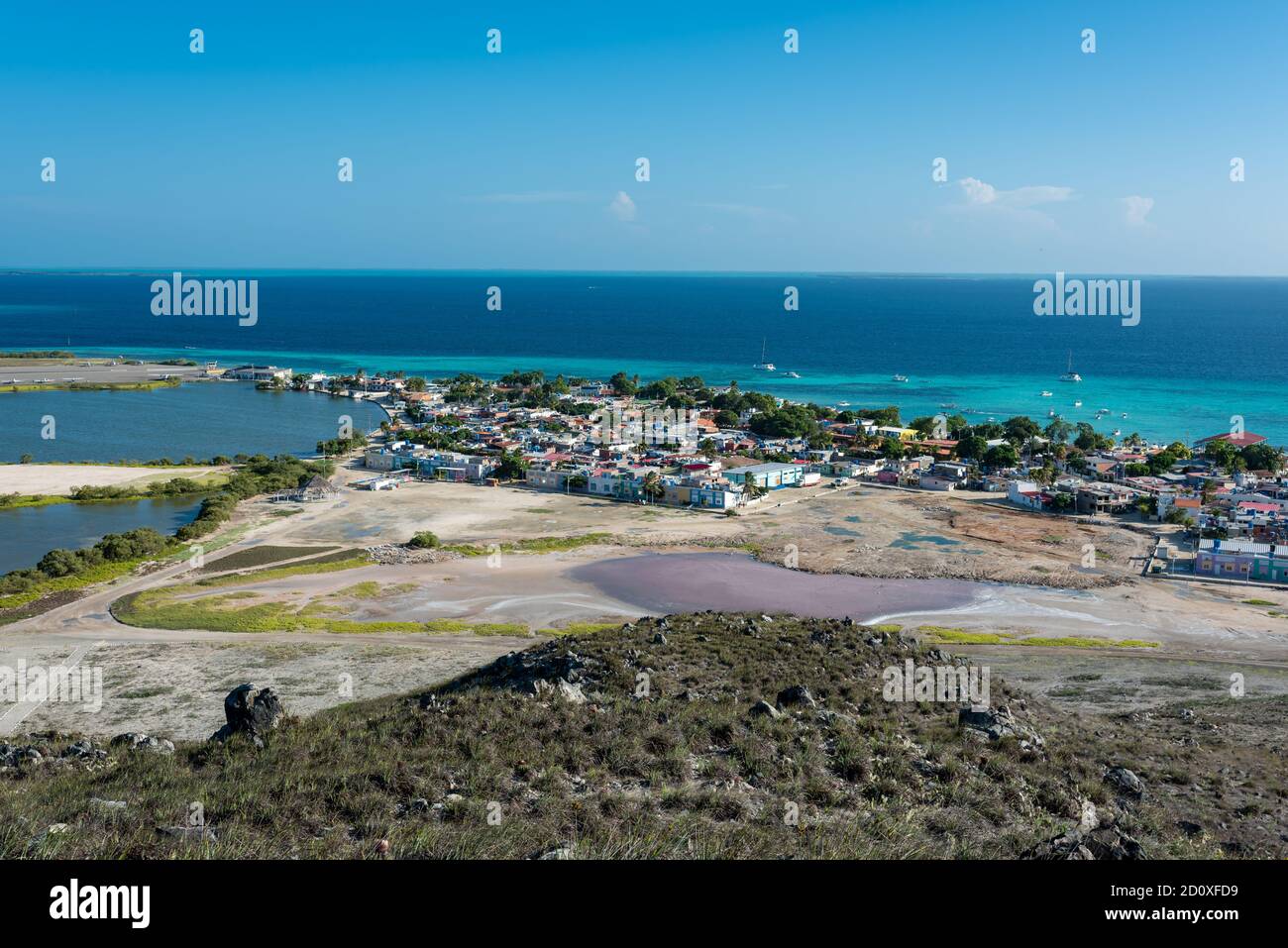 Top view of the village in Gran Roques island with the touristic airport (Los Roques Archipelago, Venezuela). Stock Photo