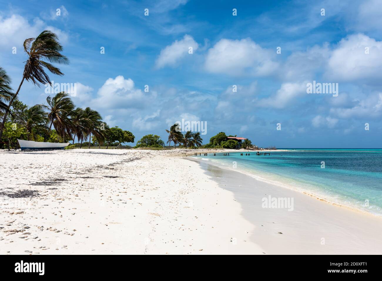 Tropical white beach with crystalline water in Dos Mosquises islands ...