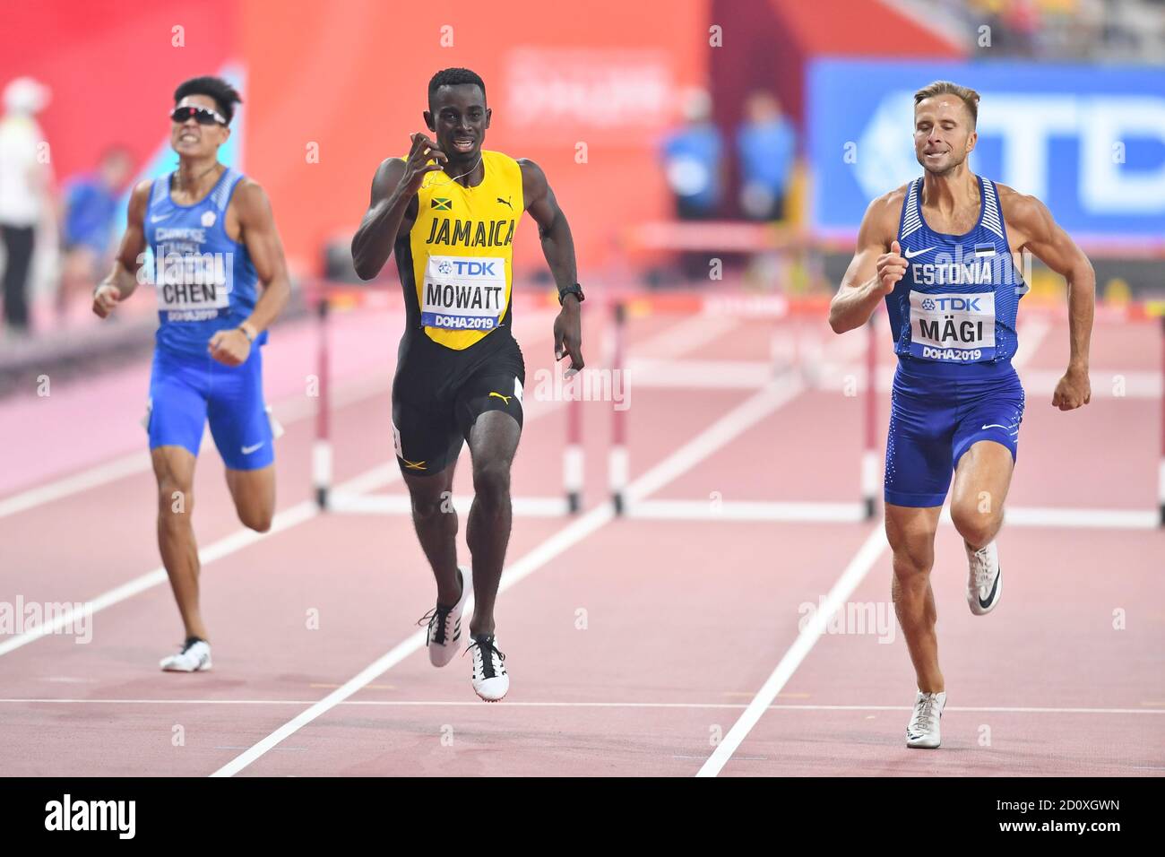 Rasmus Magi (Estonia), Kemar Mowatt (Jamaica), Chieh Chen (Taipei). 400 metres hurdles, Semi final. IAAF World Athletics Championships, Doha 2019 Stock Photo