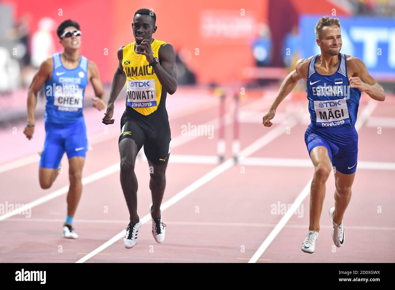 Rasmus Magi (Estonia), Kemar Mowatt (Jamaica), Chieh Chen (Taipei). 400 metres hurdles, Semi final. IAAF World Athletics Championships, Doha 2019 Stock Photo