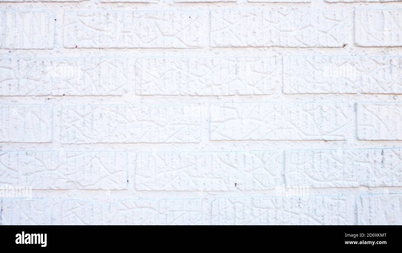 White Wall With Painted Bricks Stock Photo
