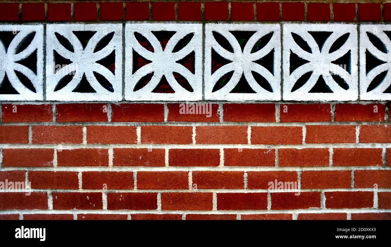 Red Brick Wall With Floral Detailed Concrete Blocks Stock Photo Alamy