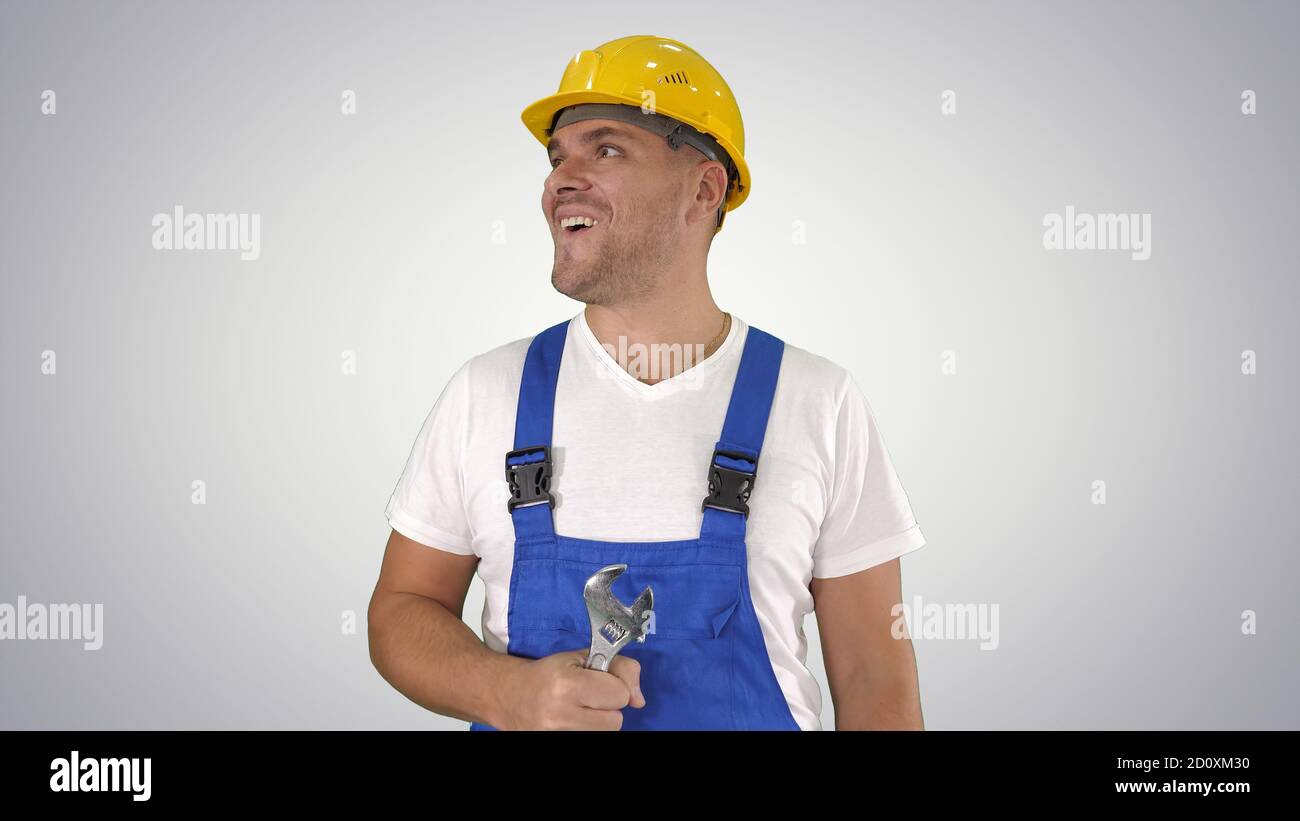 Friendly constructor willing to fix something Showing thumb up o Stock Photo