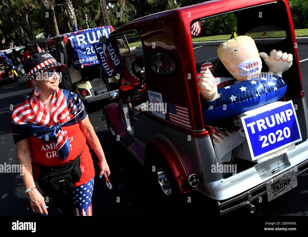 October 3, 2020 - The Villages, Florida, United States - Residents queue up to participate in a golf cart parade in support of the re-election of U.S. President Donald Trump on October 3, 2020 in The Villages, Florida, a retirement community north of Orlando. Trump was admitted to Walter Reed Hospital yesterday after contracting COVID-19. (Paul Hennessy/Alamy Live News) Stock Photo