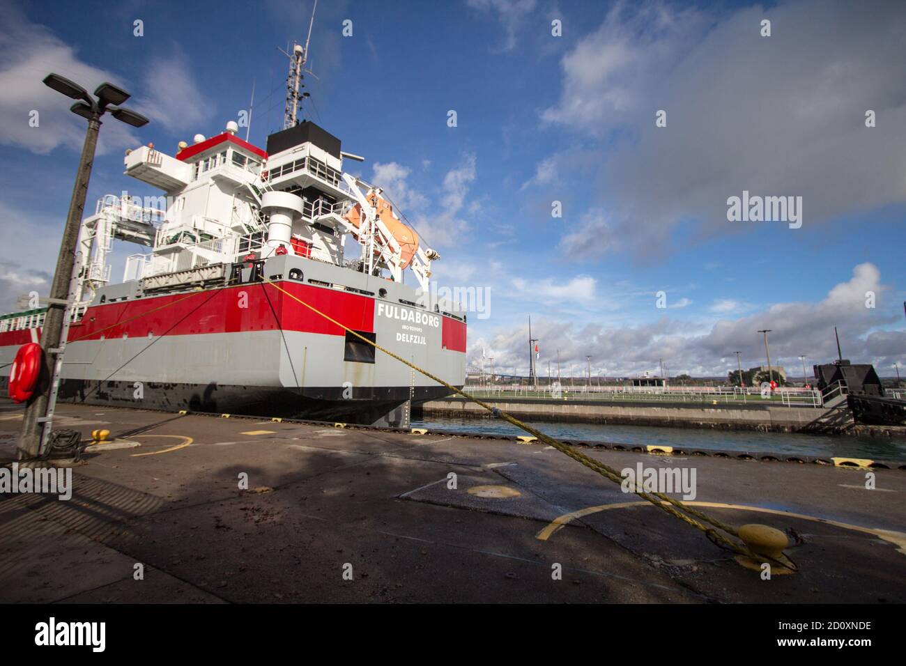 Sault Ste Marie, Michigan, USA -  Ocean freighter the Fuldaborg sails through the Soo Locks at tourists watch from the shore. Stock Photo