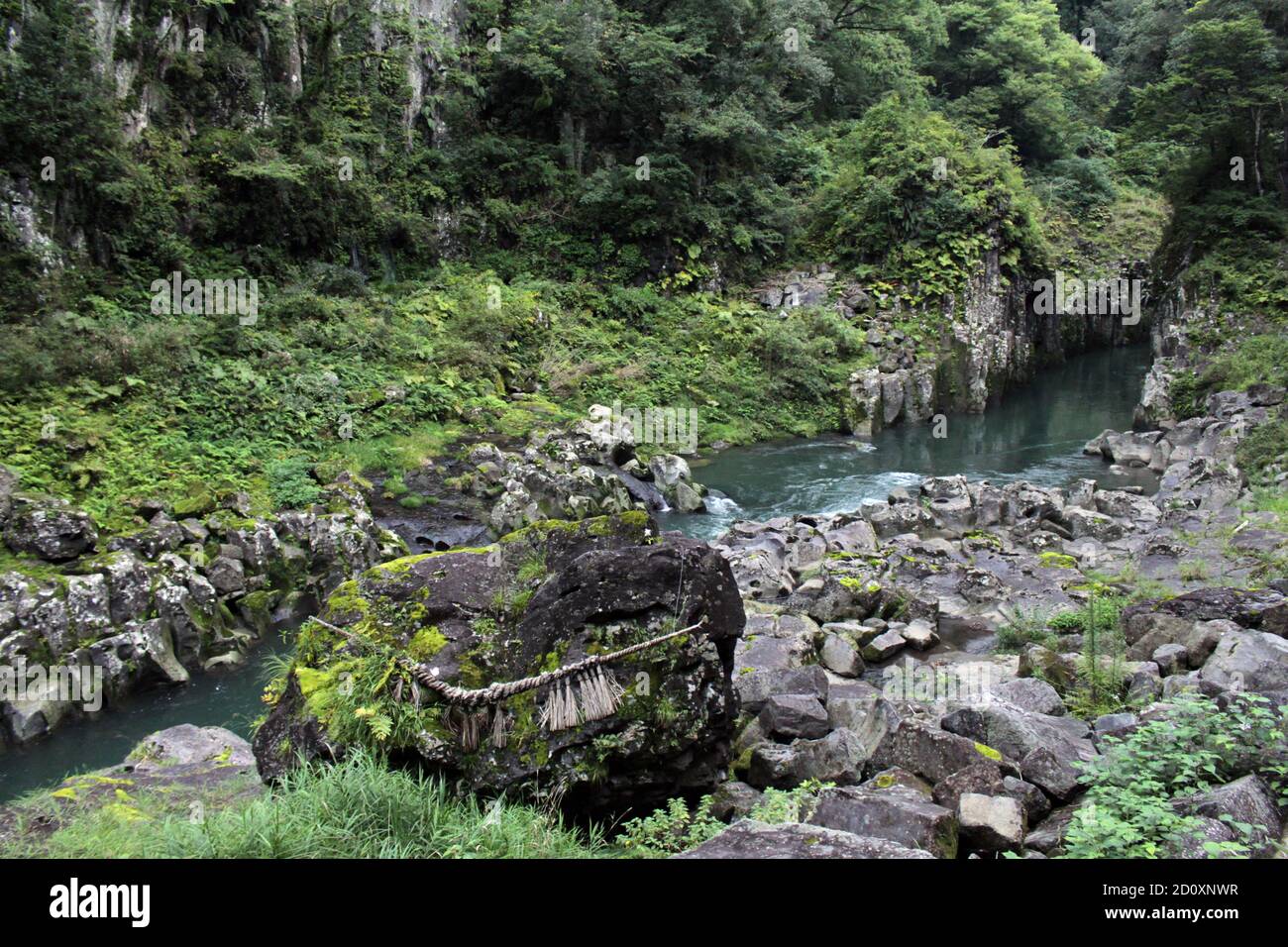 Rock, shimenawa rope, and river around Takachiho Gorge in Miyazaki ...