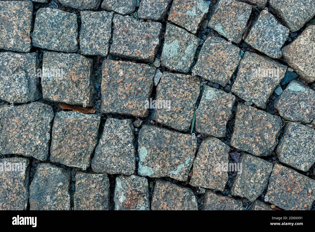 Abstract street background of old Stone pavement close up. Stock Photo