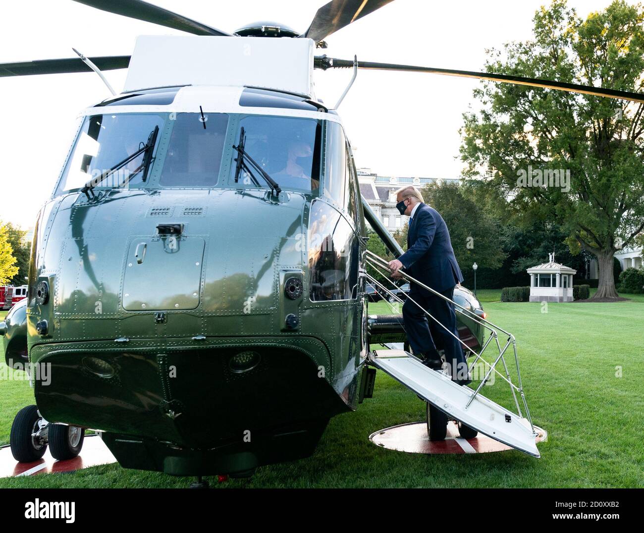 Washington, United States Of America. 02nd Oct, 2020. President Donald J. Trump boards Marine One on the South Lawn of the White House Friday, Oct. 2, 2020, en route to Walter Reed National Military Medical Center in Bethesda, Md. People: President Donald Trump Credit: Storms Media Group/Alamy Live News Stock Photo