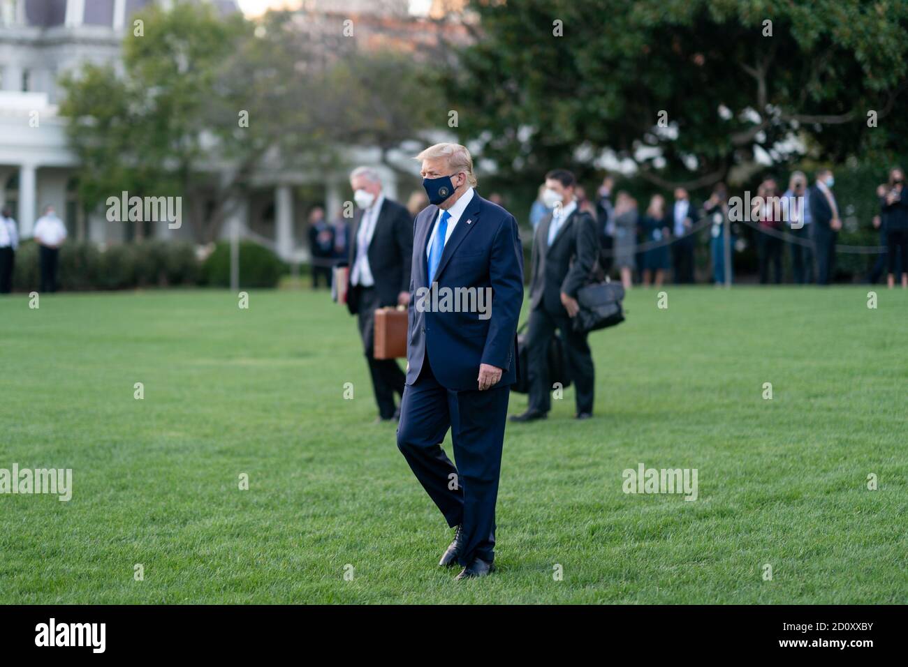 Washington, United States Of America. 02nd Oct, 2020. President Donald J. Trump walks across the South Lawn of the White House before boarding Marine One Friday, Oct. 2, 2020, en route to Walter Reed National Military Medical Center in Bethesda, Md People: President Donald Trump Credit: Storms Media Group/Alamy Live News Stock Photo