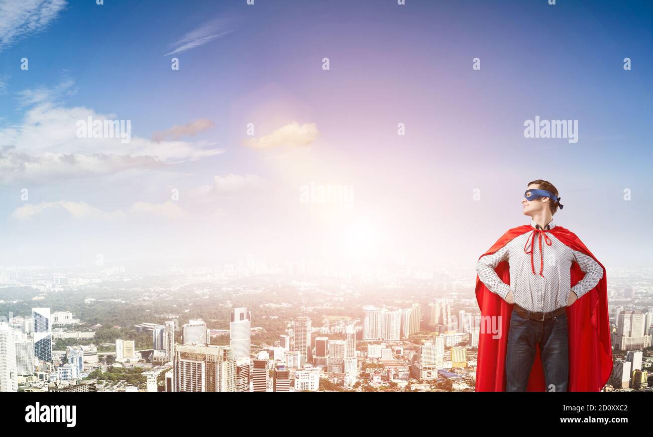 Confident super hero Stock Photo - Alamy