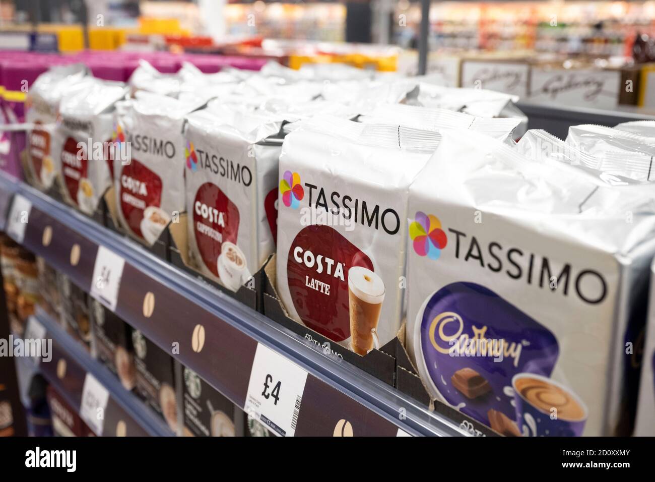 Packets of Tassimo coffee capsules on sale on a shelf in a supermarket in Cardiff, Wales, United Kingdom. Stock Photo