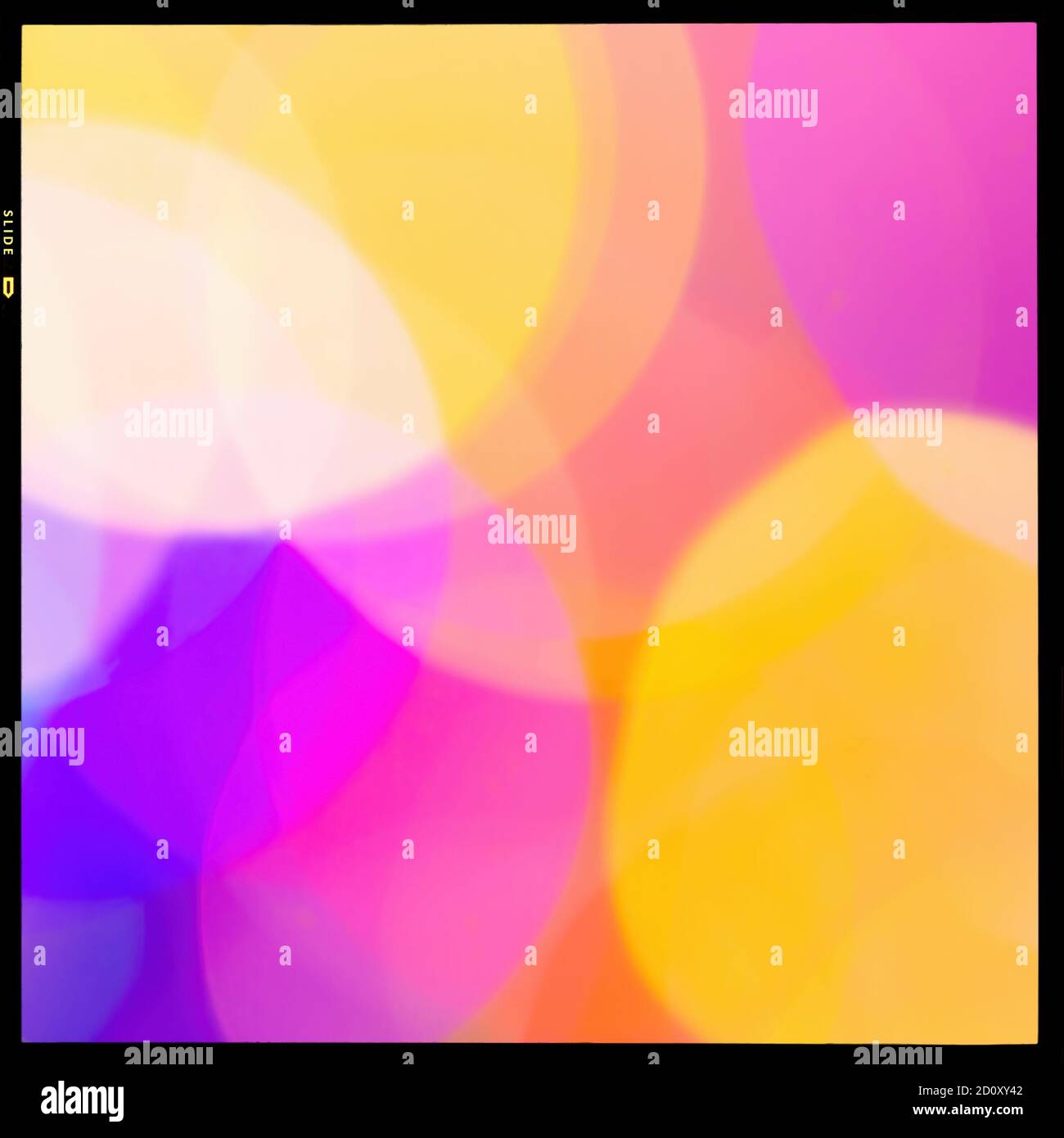 Blurred abstract colored spotted pink, yellow, white, purple background