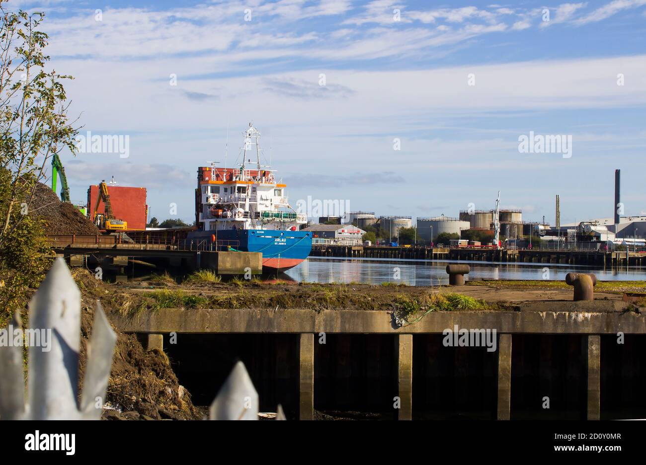 27 September 2020 The general cargo ship Arlau moored in Belfast Northern Ireland blends into the industrial landscape of the Titanic Quarter on Queen Stock Photo