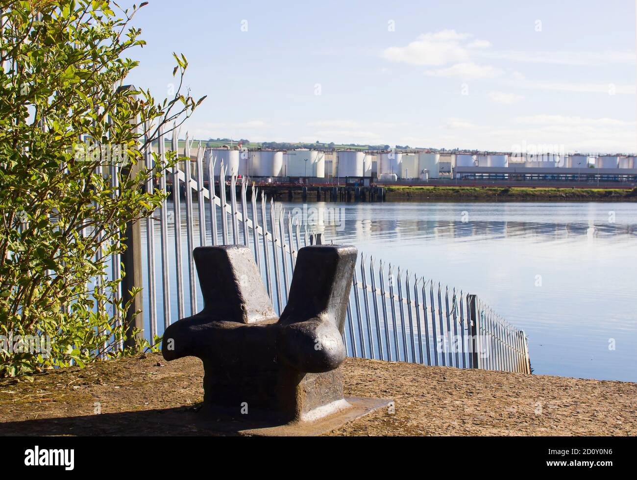 27 September 2020 A large cast iron quayside mooring bollard pictured on a bright sunny morning. Located close to the Belfast Oil Terminal storage fac Stock Photo