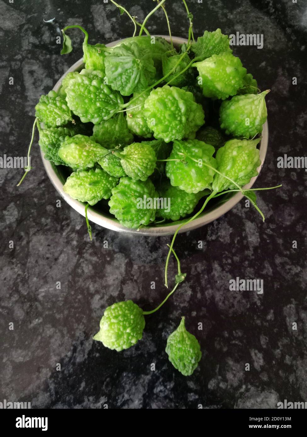small bitter gourd vegetable in a bowl indian variety Stock Photo Alamy
