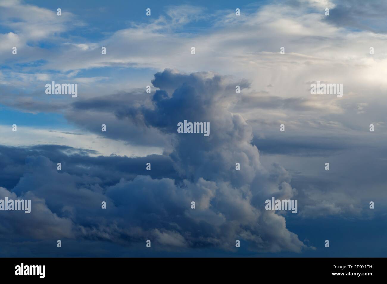 Cloud formation against a blue sky Stock Photo - Alamy