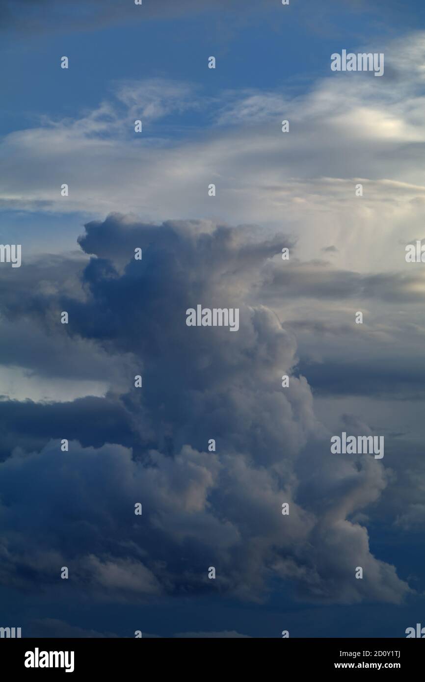Cloud formation against a blue sky Stock Photo - Alamy
