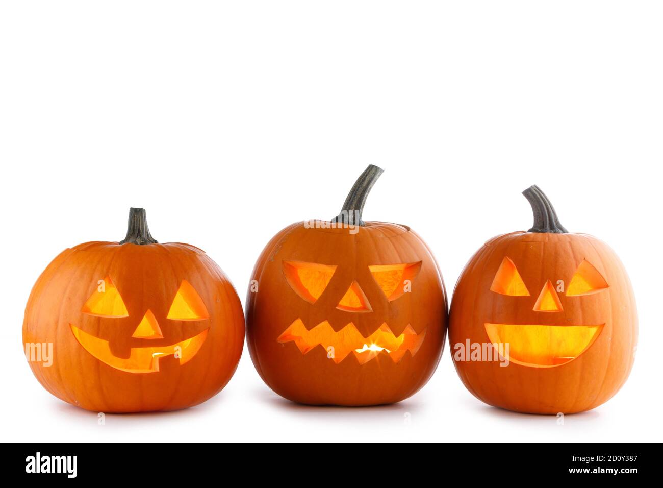 Three Halloween Pumpkins isolated on white background Stock Photo - Alamy