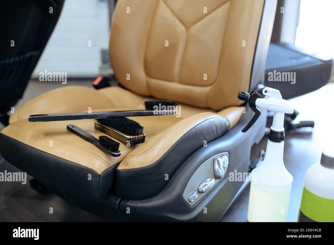 Leather car seats and brushes for dry cleaning Stock Photo Alamy