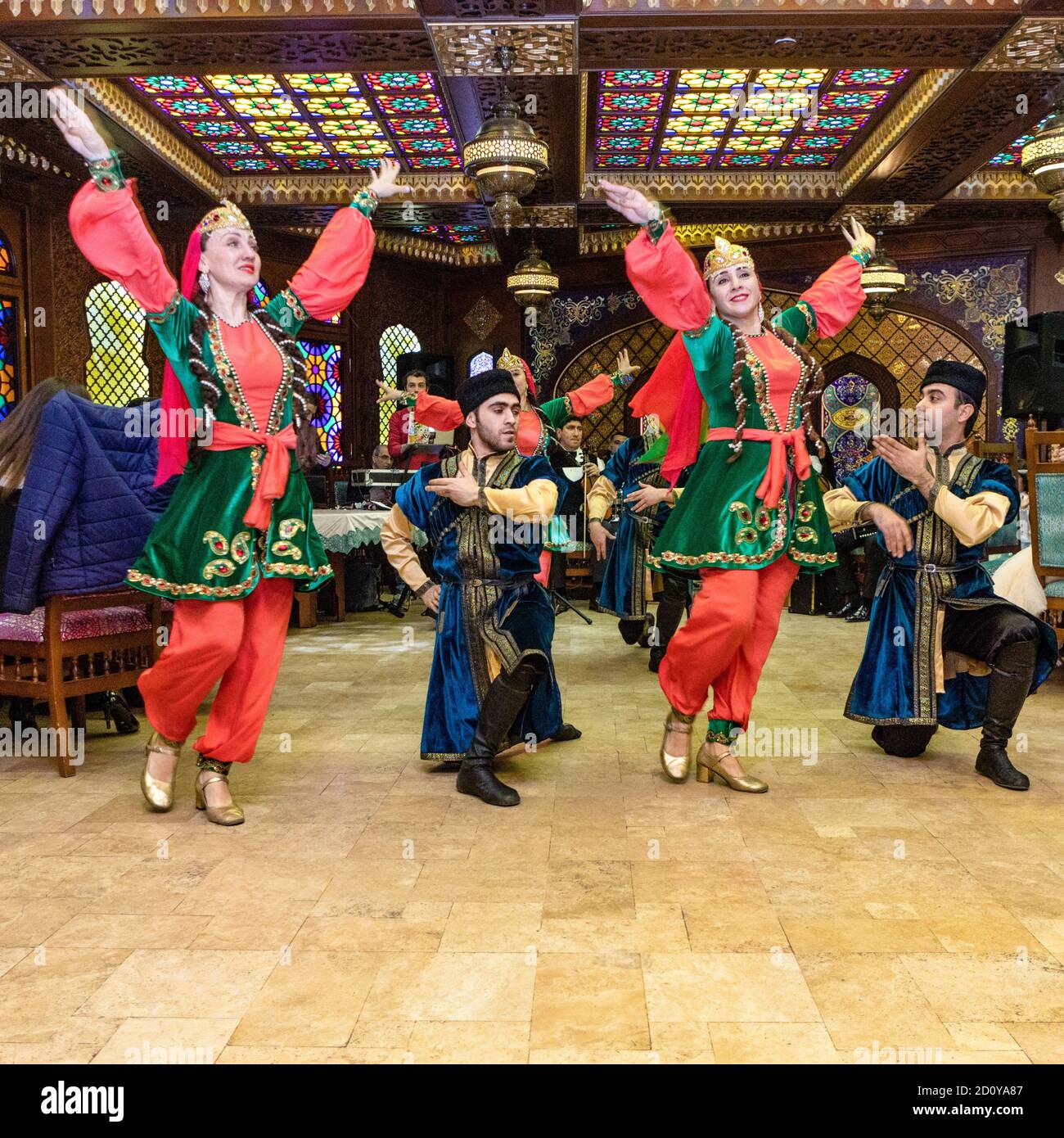 Azerbaijani traditional dancers performing indoor Stock Photo - Alamy