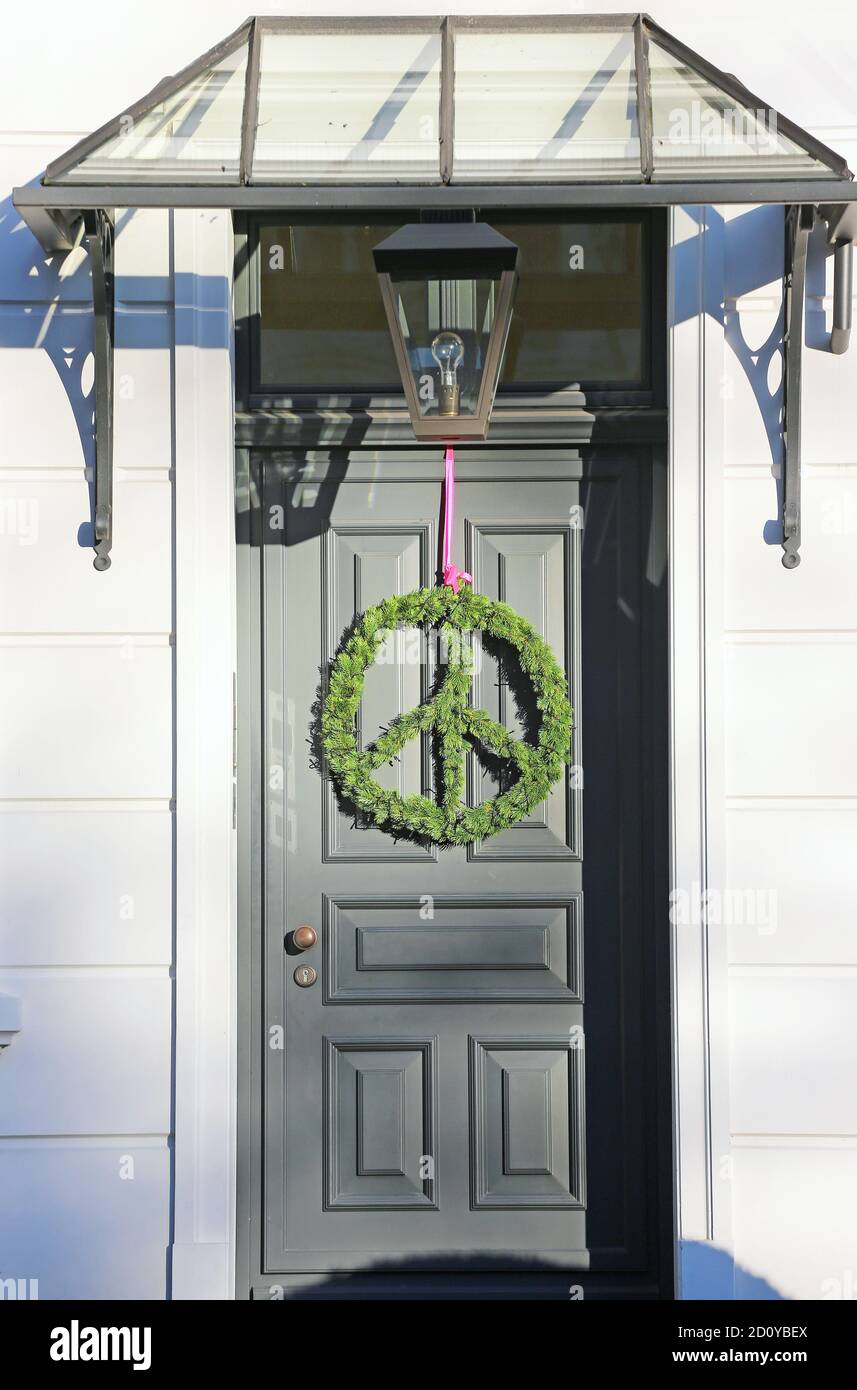 peace wreath on the entry door Stock Photo