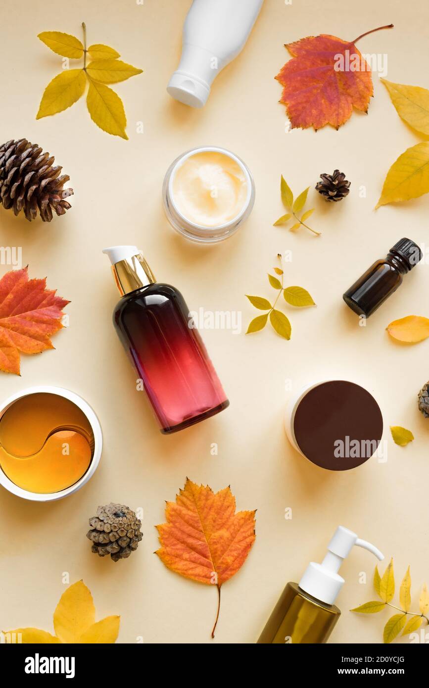 Autumn Skin Care products and autumn leaves on yellow background, flat lay,  copy space. Seasonal beauty routine and organic cosmetic concept Stock  Photo - Alamy