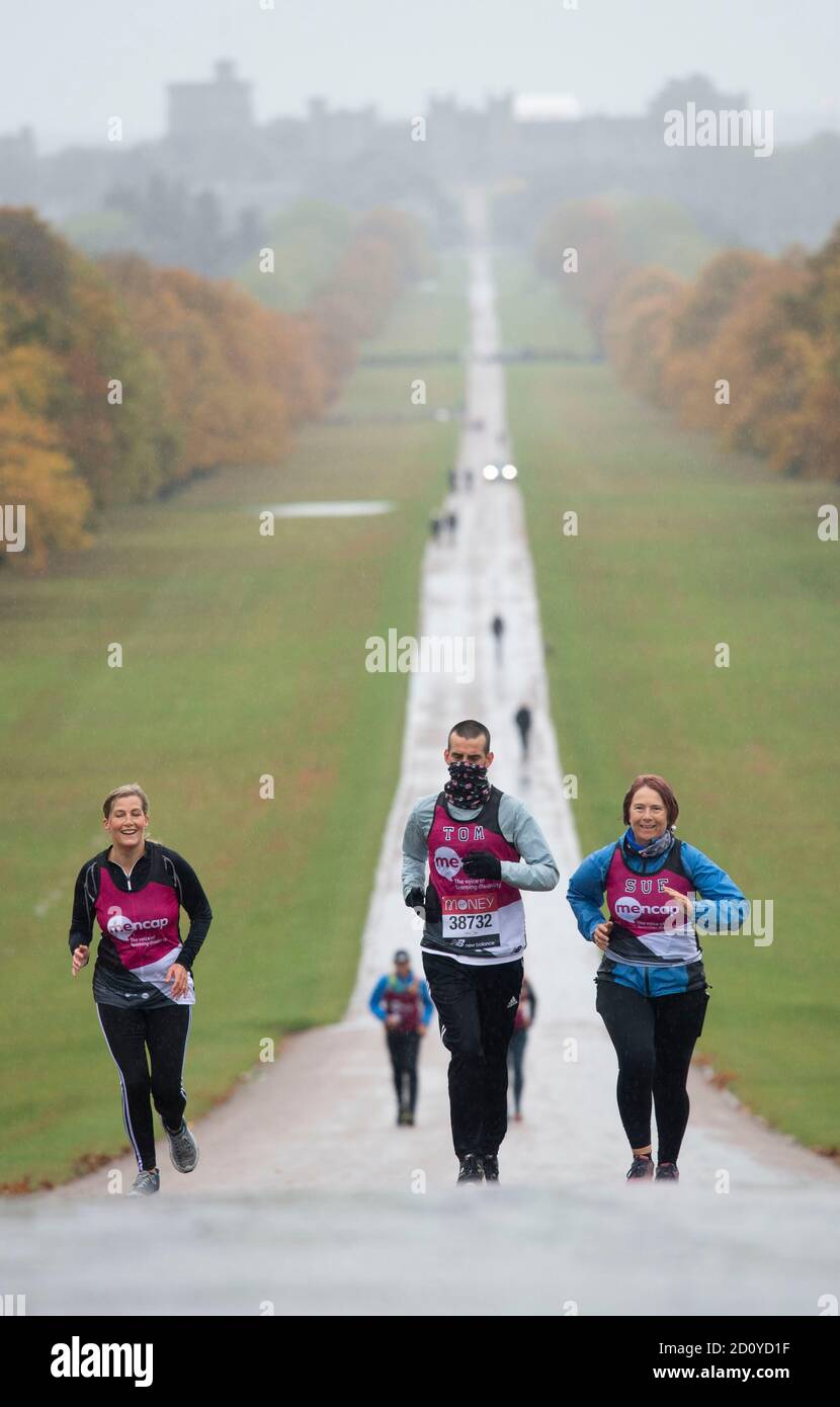 Sophie the Countess of Wessex (left) who joined Tomas Cardillo-Zallo, a member of Mencap's learning disability running team and his mother Sue, acting as his guide runner, for the first 1.5 miles of their virtual London Marathon on the Long Walk in Windsor. Stock Photo