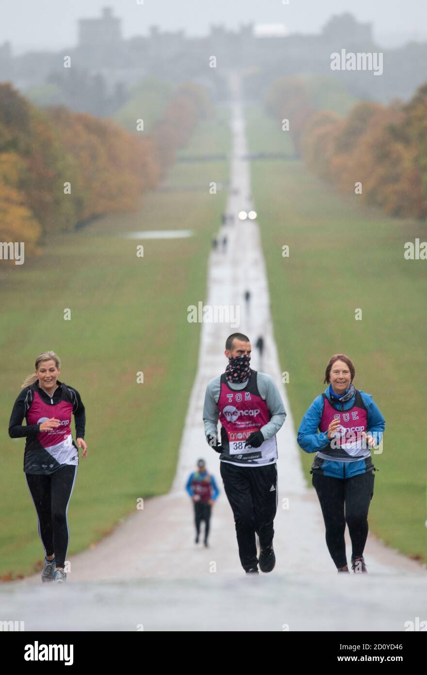Sophie the Countess of Wessex (left) who joined Tomas Cardillo-Zallo, a member of Mencap's learning disability running team and his mother Sue, acting as his guide runner, for the first 1.5 miles of their virtual London Marathon on the Long Walk in Windsor. Stock Photo