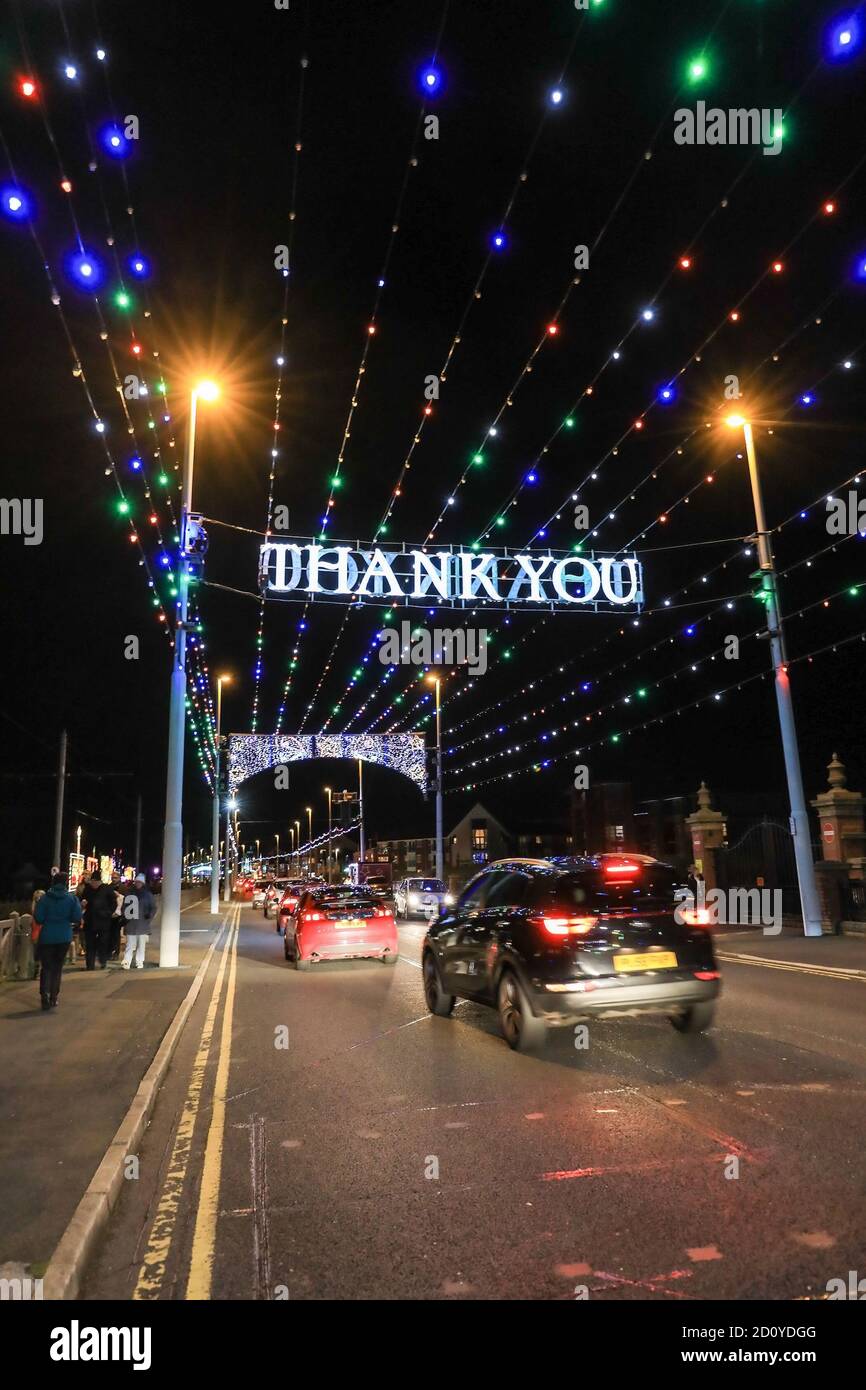 A donation collection point with 'thank you' in lights at Blackpool Illuminations, Blackpool, Lancashire, England, UK Stock Photo