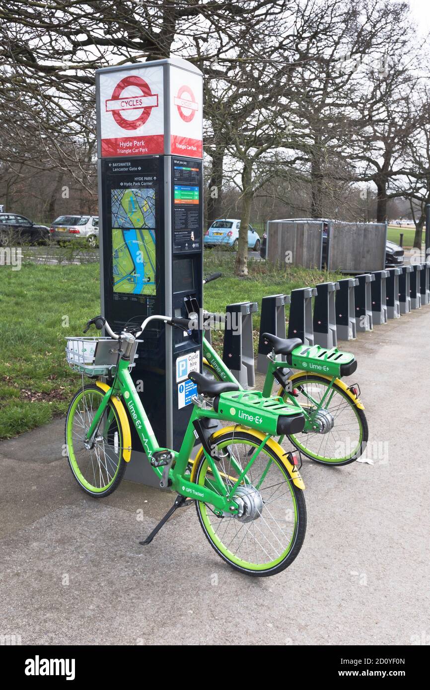 dh Electric hire bikes station HYDE PARK LONDON ENGLAND UK Lime E bike cycle park cycles for rent ebikes bicycle ebike Stock Photo